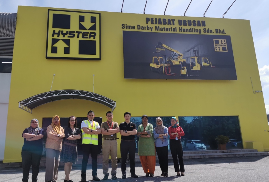 Sime Darby Industrial signs materials handling dealership with Hyster